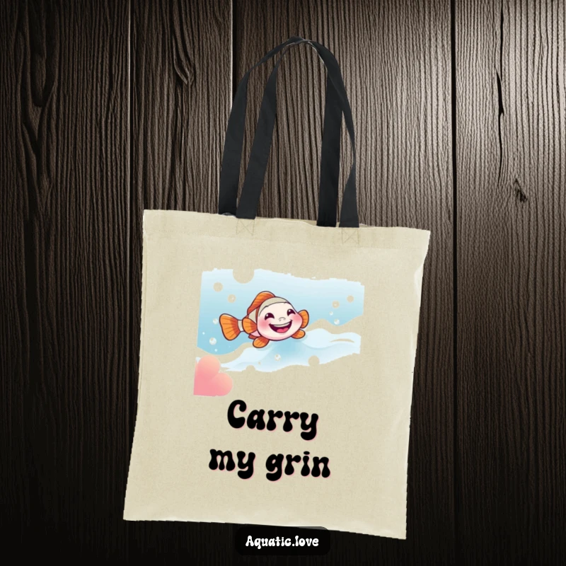 Funny tote bag showcasing a little clownfish with a wide grin sliding down a bubbly current, perfect for carrying your essentials with a smile.